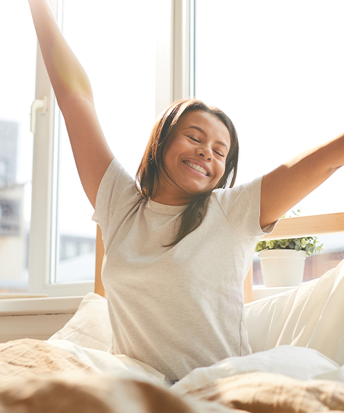 girl waking up in bed